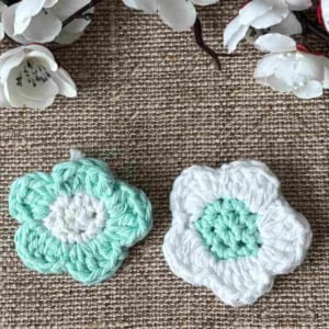 white and blue crochet flowers