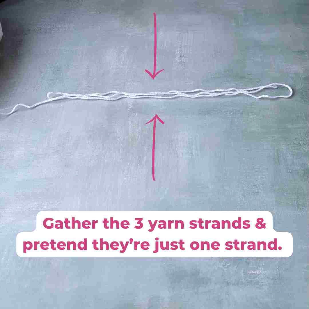 how to make thin yarn thicker yarn laying on table