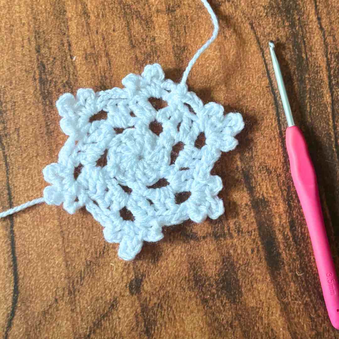 beginner snowflake coaster crochet tutorial with step-by-step photos