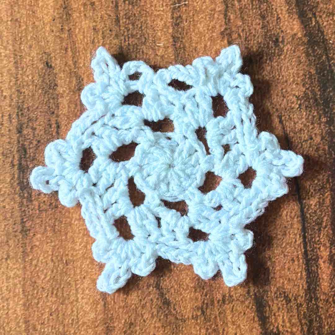 beginner snowflake coaster crochet tutorial with step-by-step photos