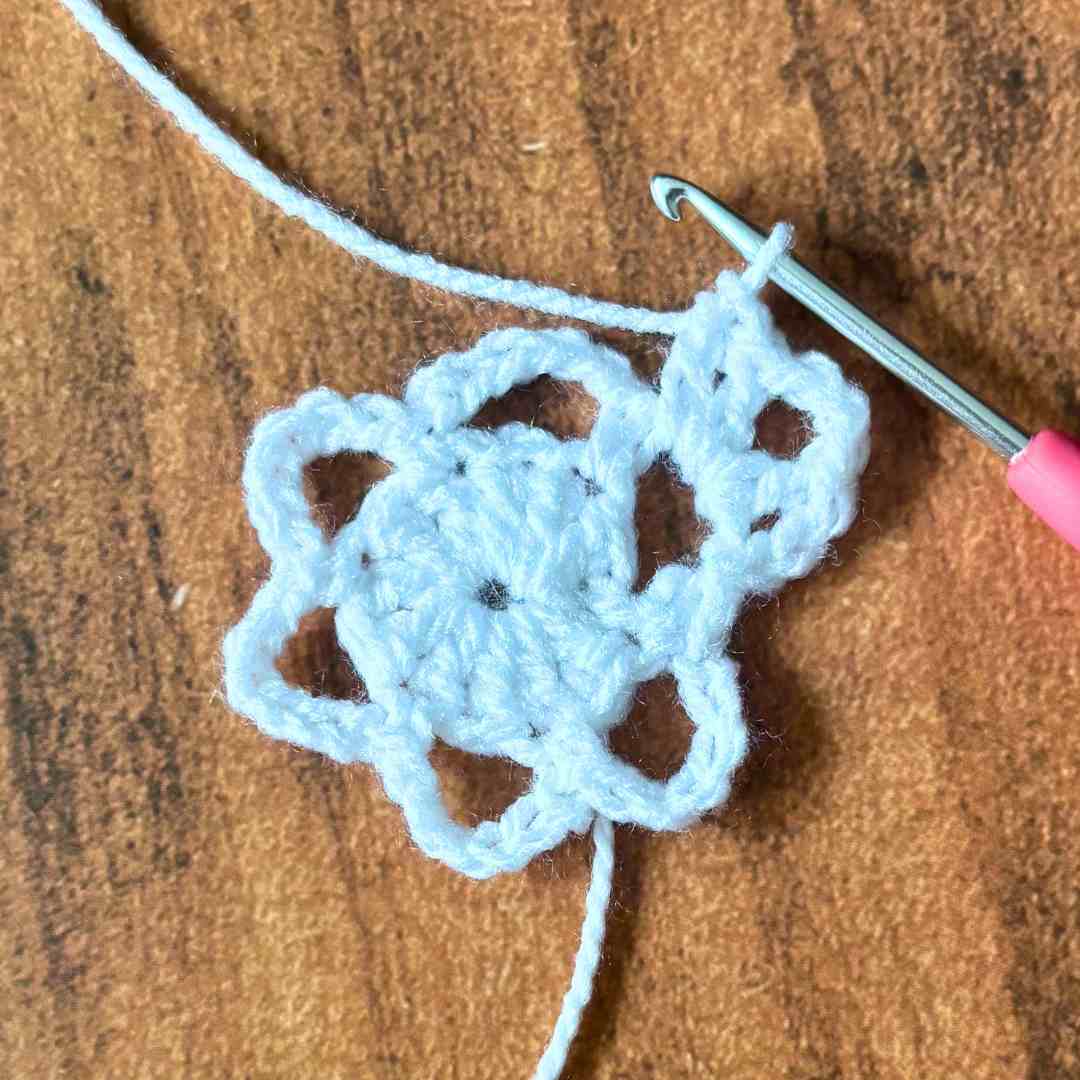 beginner snowflake coaster crochet tutorial with step-by-step photos