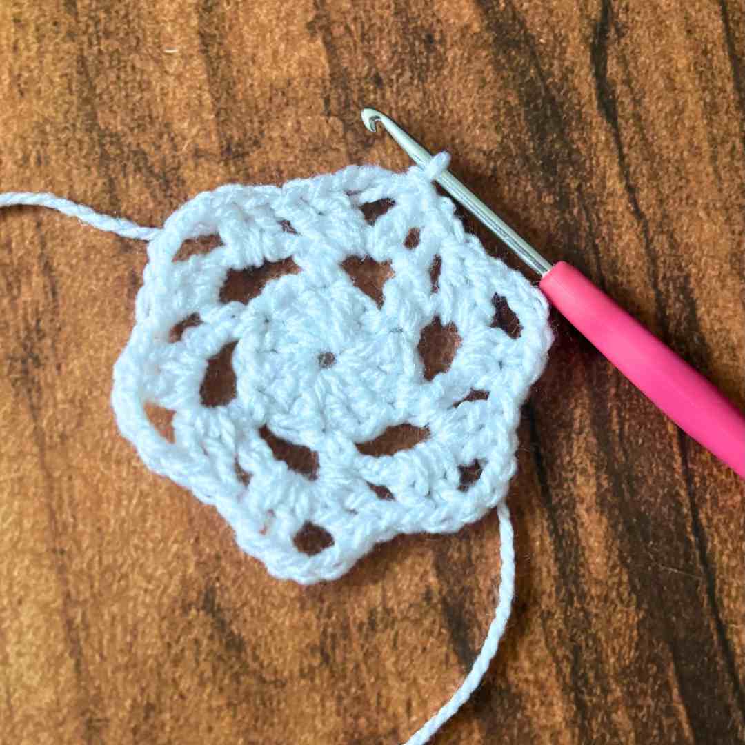 beginner snowflake coaster crochet tutorial with step-by-step photos